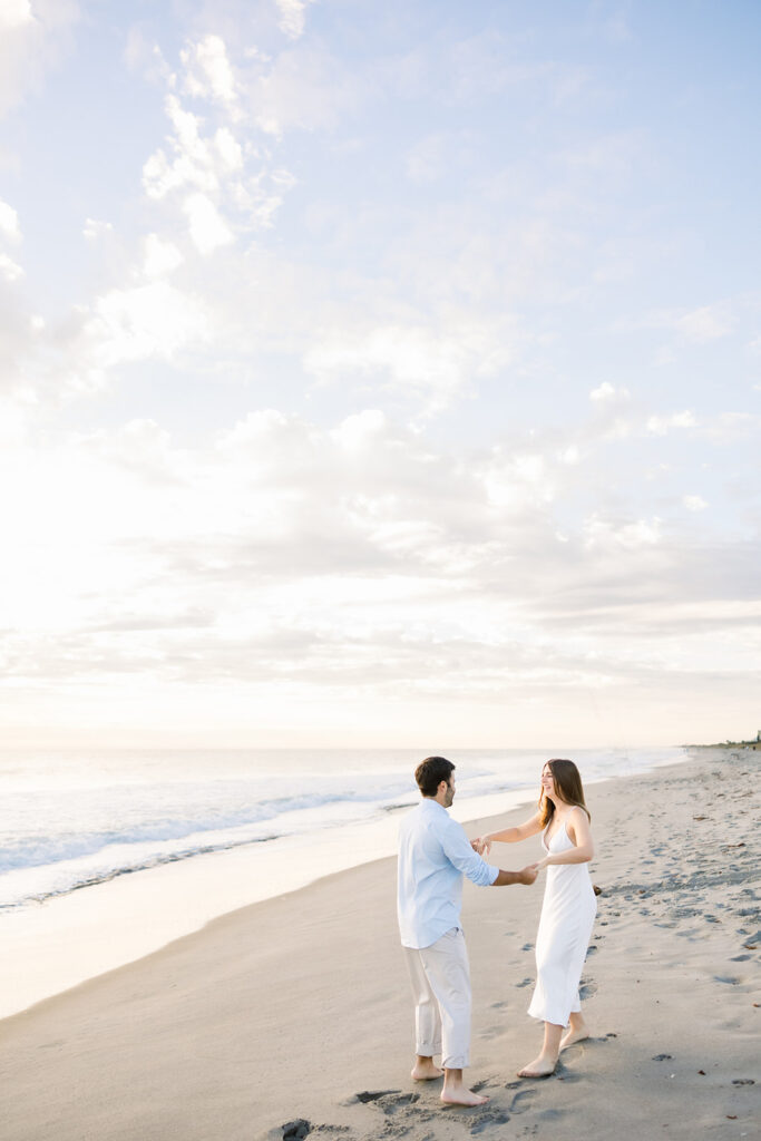 Beach engagement session by Florida wedding photographer