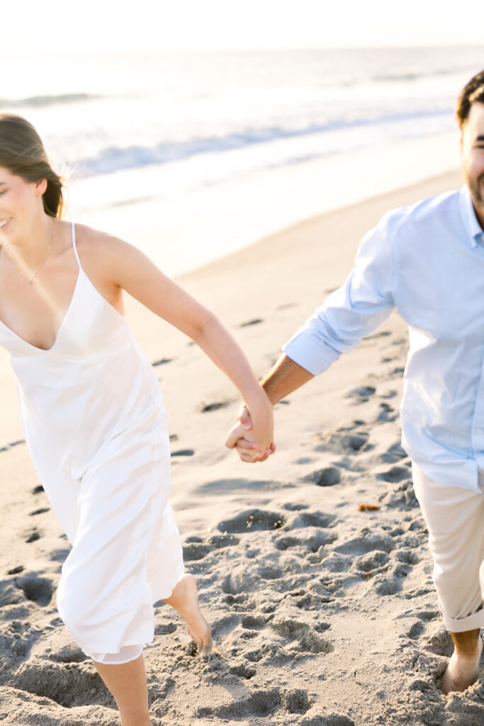 Beach engagement session by Florida wedding photographer