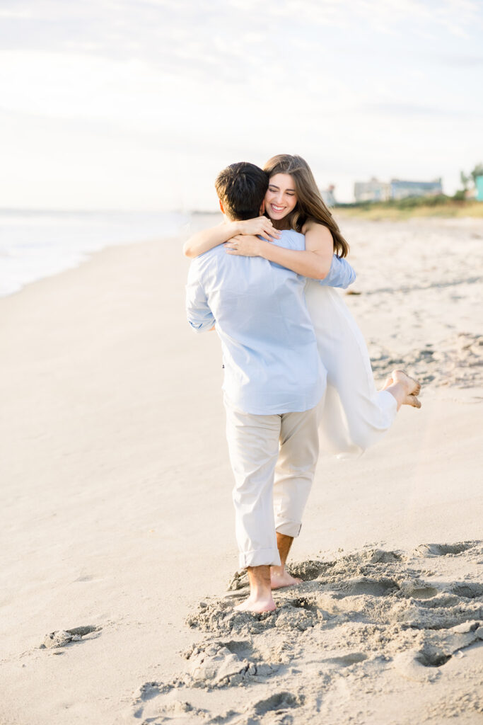 Beach engagement session by Florida wedding photographer