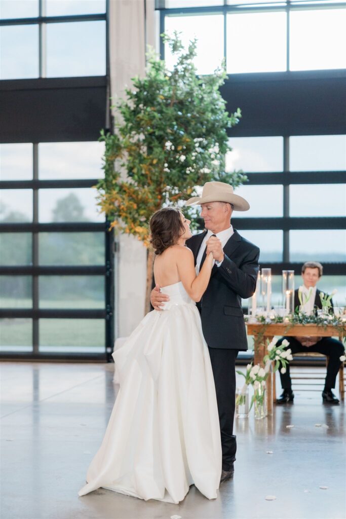 Father of the bride speech captured by Florida wedding photographer and videographer.