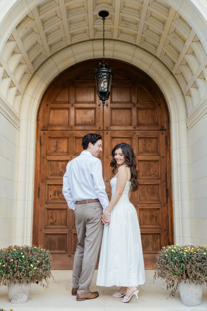 Engagement photos lakeside at  Rollins College with the sunset coming down captured by Florida wedding photographer, Angelika Krug Photo & Film. 