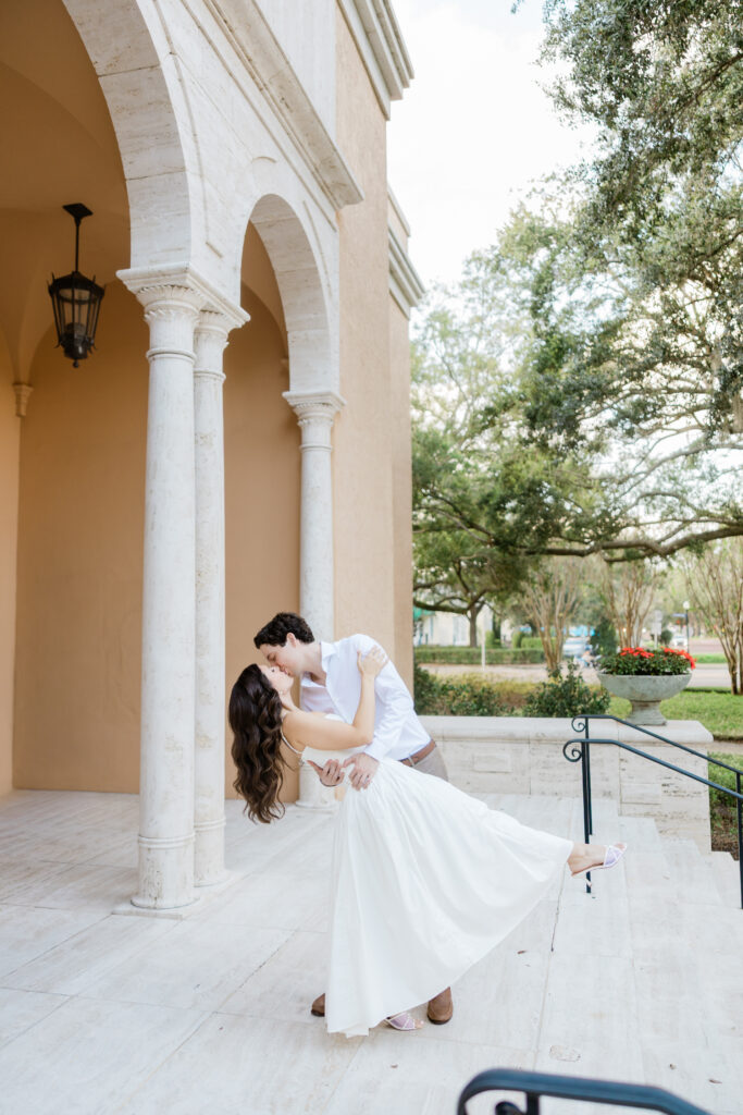 An engagement session at Rollins college showcasing the beautiful architecture at Rollins College captured by Florida wedding photographer Angelika Krug Photo & Film 