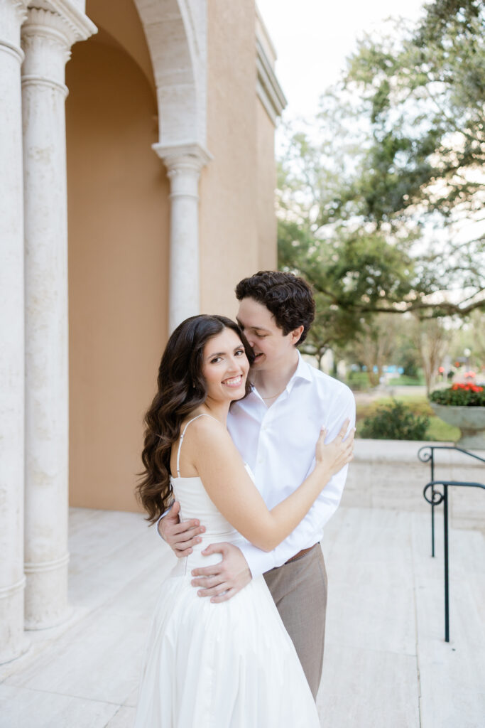 An engagement session at Rollins college showcasing the beautiful architecture at Rollins College captured by Florida wedding photographer Angelika Krug Photo & Film 