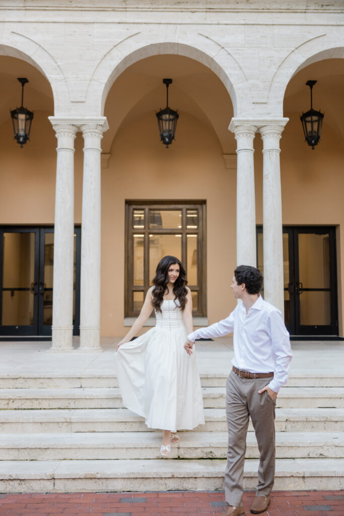 An engagement session at Rollins college showcasing the beautiful architecture at Rollins College captured by Florida wedding photographer Angelika Krug Photo & Film 