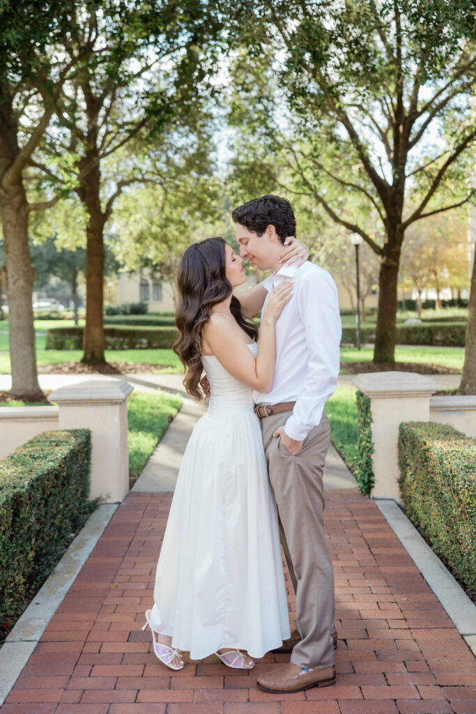 An engagement session at Rollins college showcasing the beautiful architecture at Rollins College captured by Florida wedding photographer Angelika Krug Photo & Film 