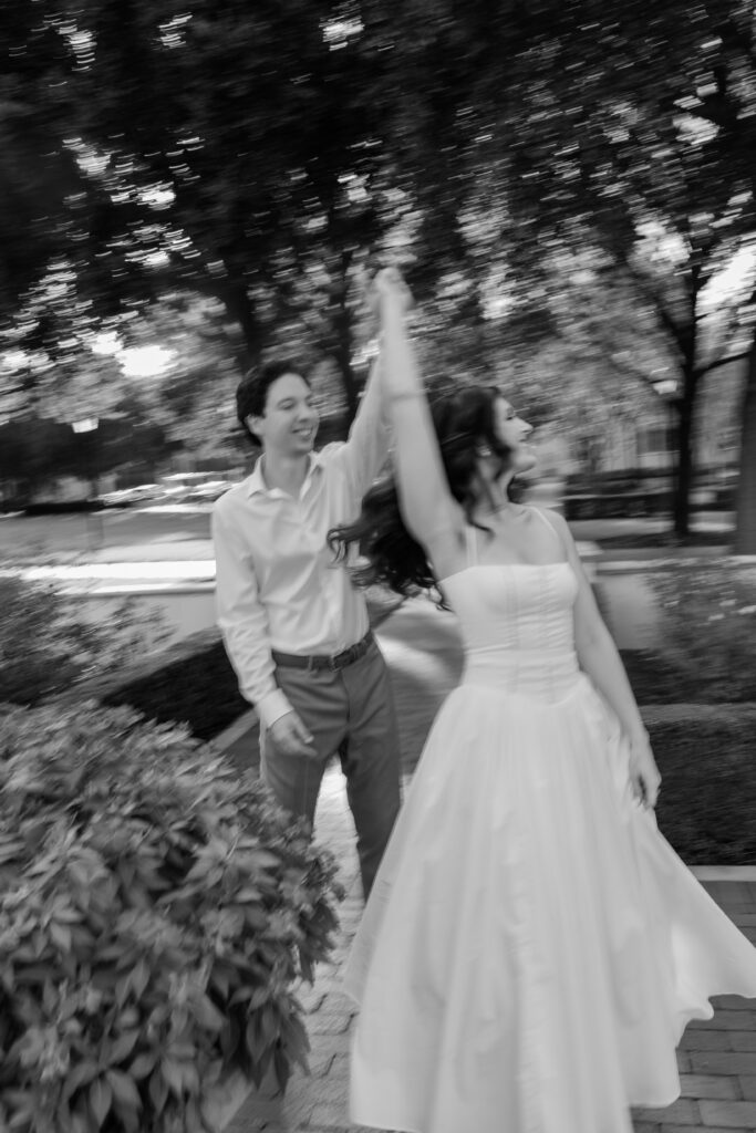 Black and white photos of an engagement session at Rollins college showcasing the beautiful architecture at Rollins College captured by Florida wedding photographer Angelika Krug Photo & Film 