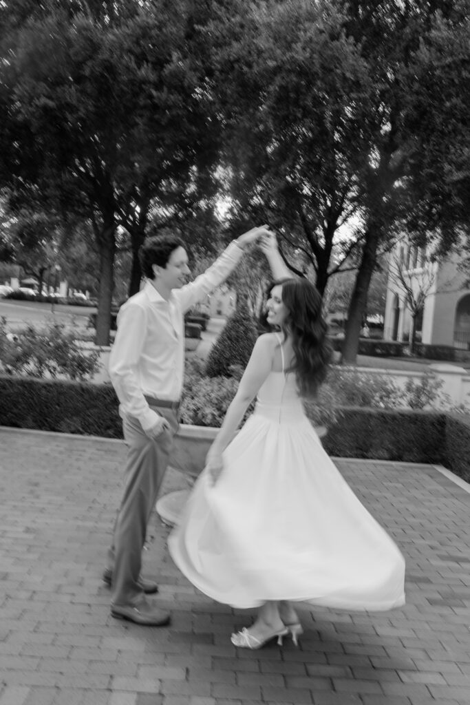 Black and white photos of an engagement session at Rollins college showcasing the beautiful architecture at Rollins College captured by Florida wedding photographer Angelika Krug Photo & Film 