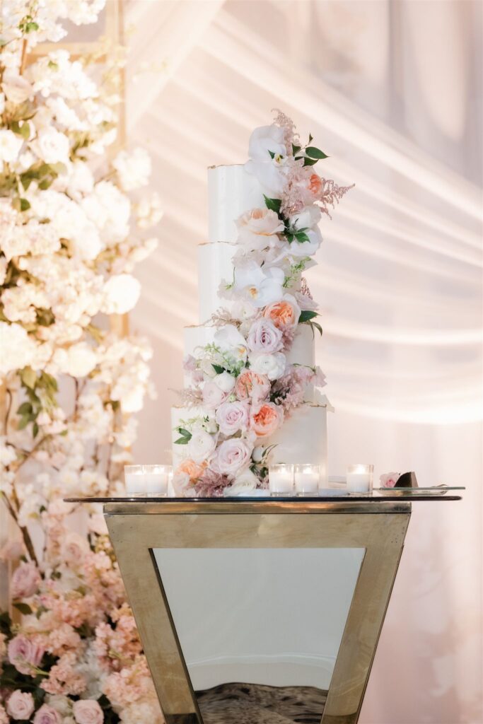 Reception room decor and florals by Petal Productions at the Loews Coral Gables wedding photographed by Angelika Krug Photo & Film a South Florida wedding photographer.